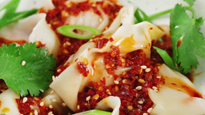 Chicken and Pork Dumplings in Chile Sesame Sauce