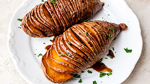 Hasselback Sweet Potatoes with Sriracha Balsamic Drizzle